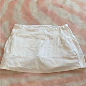 White pleated Lululemon tennis skirt